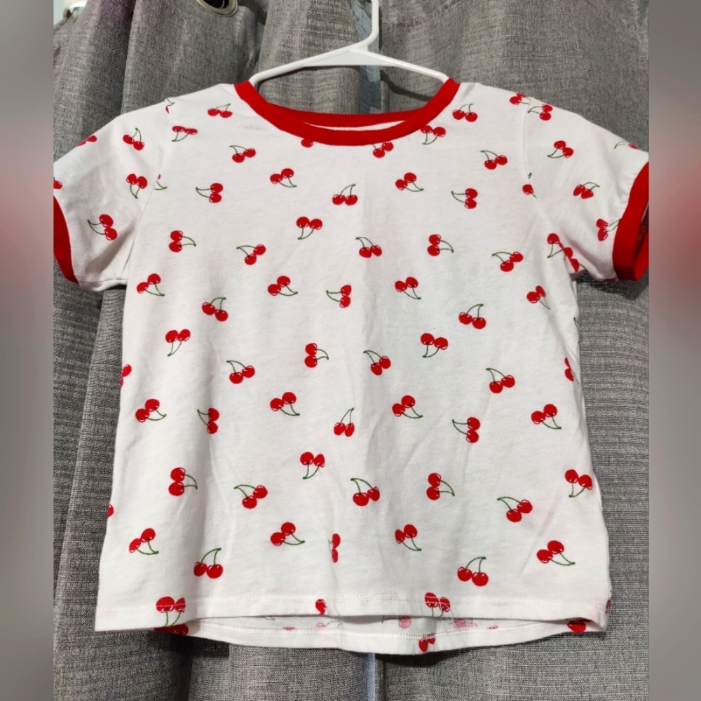 Short sleeve shirt with cherries on it